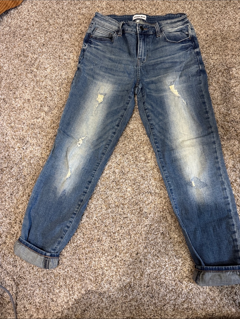 Distressed Cropped Women's Jeans in Faded Blue